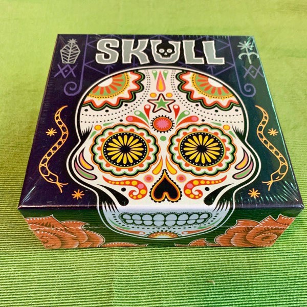 The unopened box of the game Skull